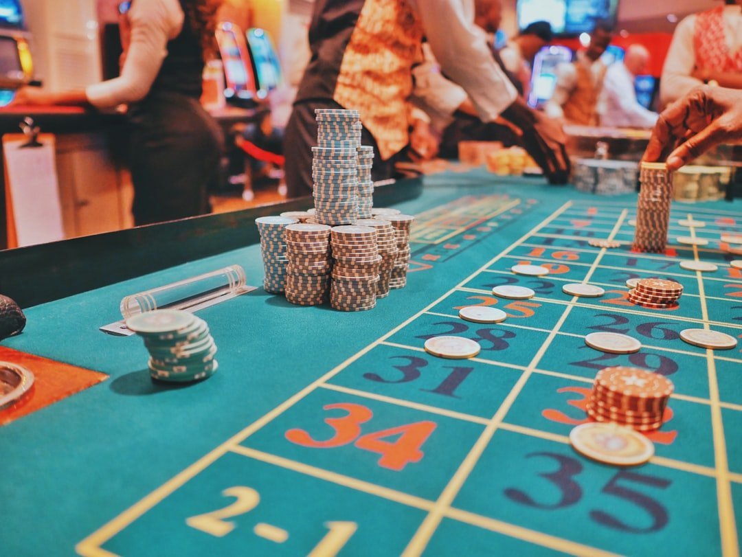 Casino gaming floor with chips on a roulette table