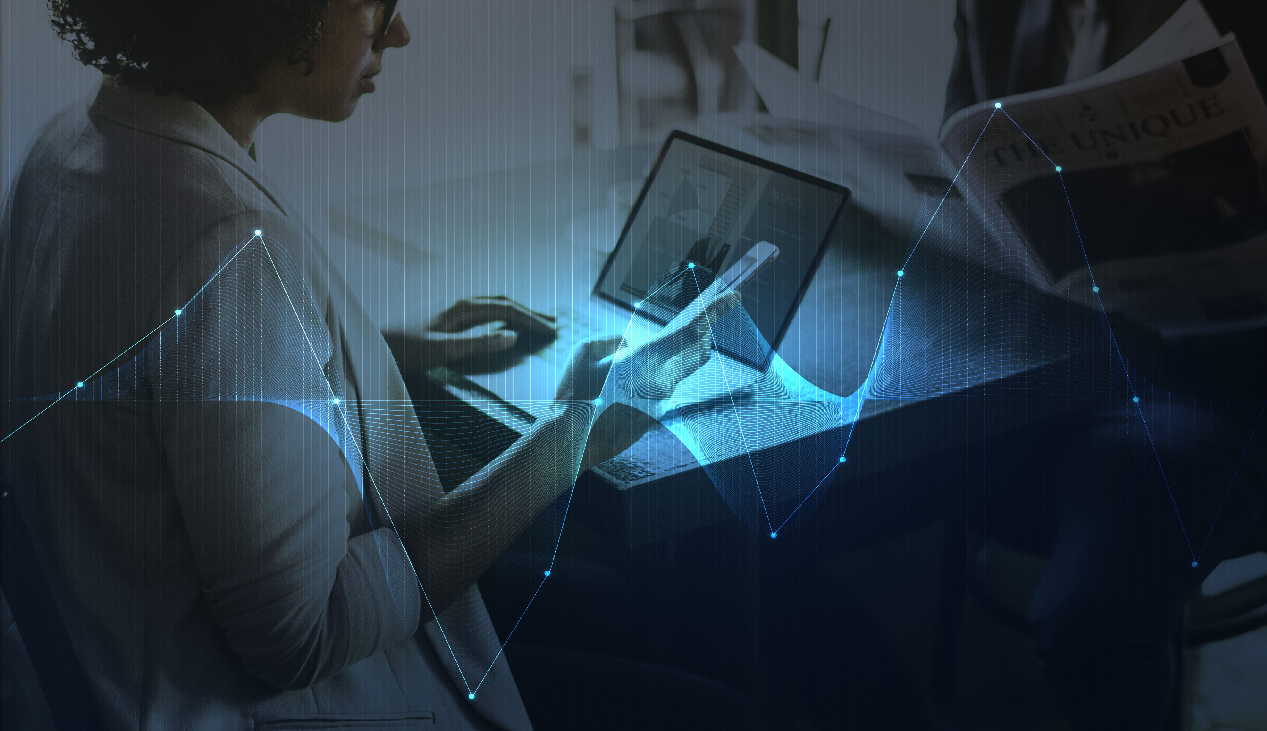 Businesswoman connecting systems across digital devices