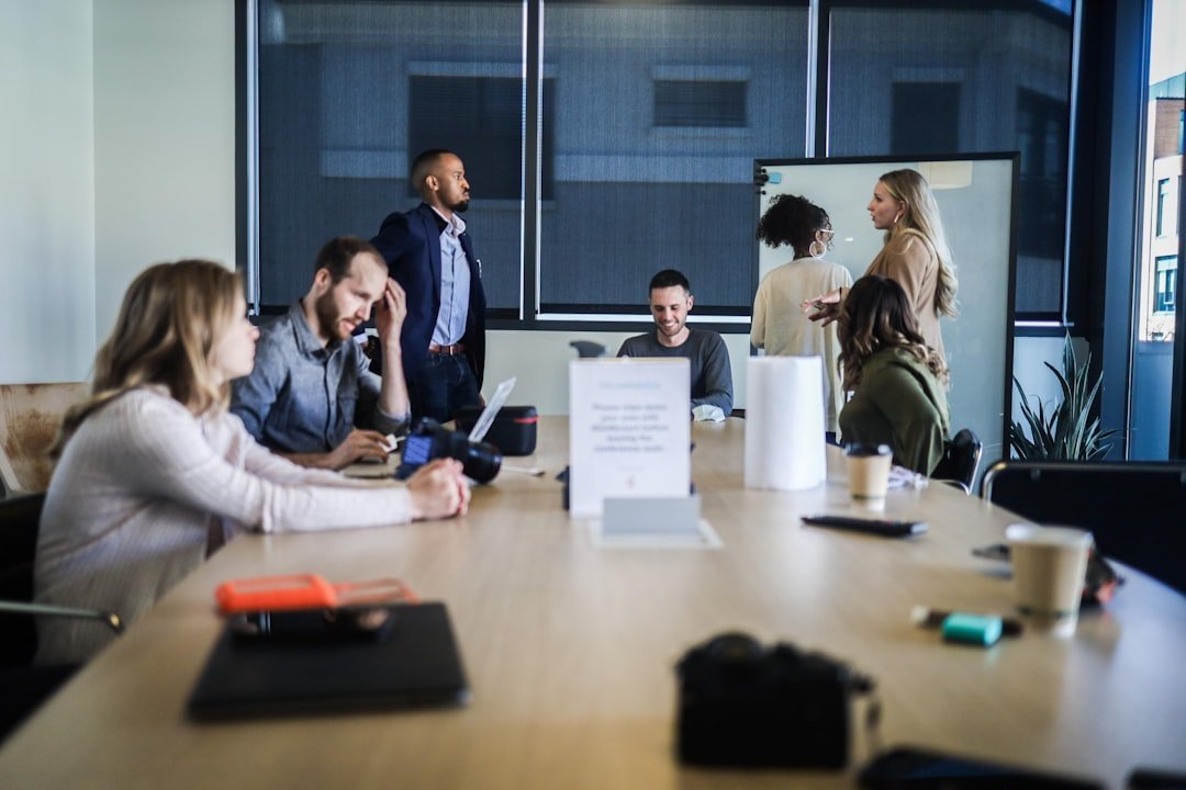 A planning team reviewing transportation network data in a meeting room
