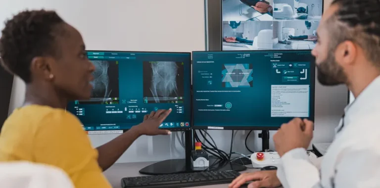 Woman and doctor discuss medical imaging results.