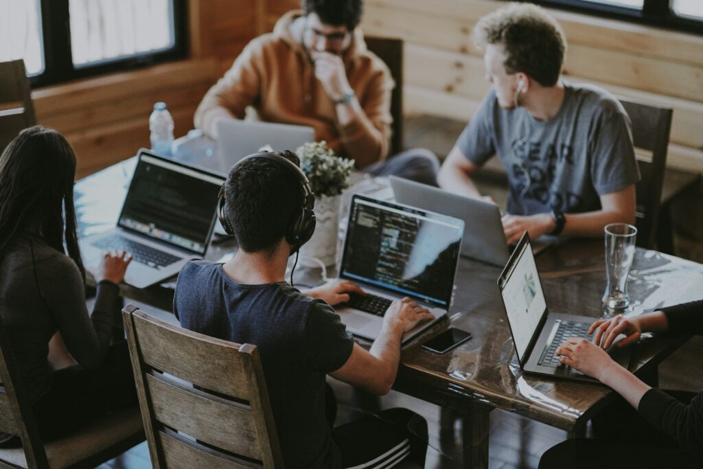 Hybrid tech team working together via remote staff augmentation
