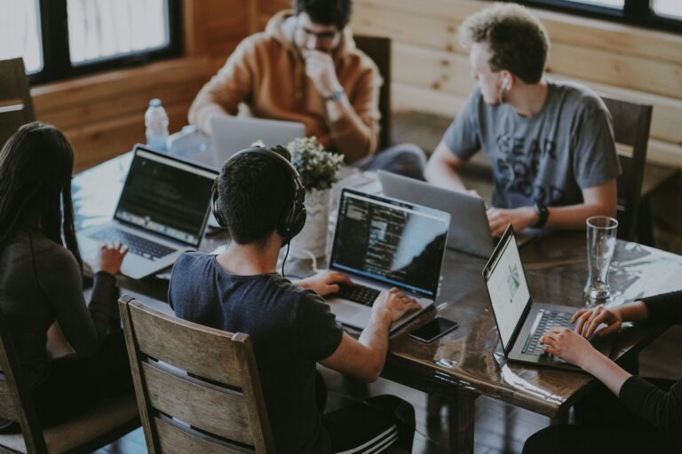Hybrid tech team working together via remote staff augmentation