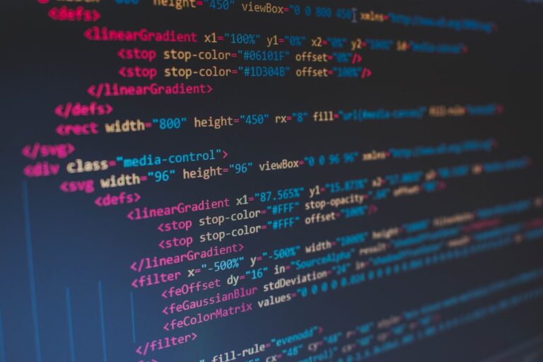 Close-up of syntax-highlighted source code on a computer monitor
