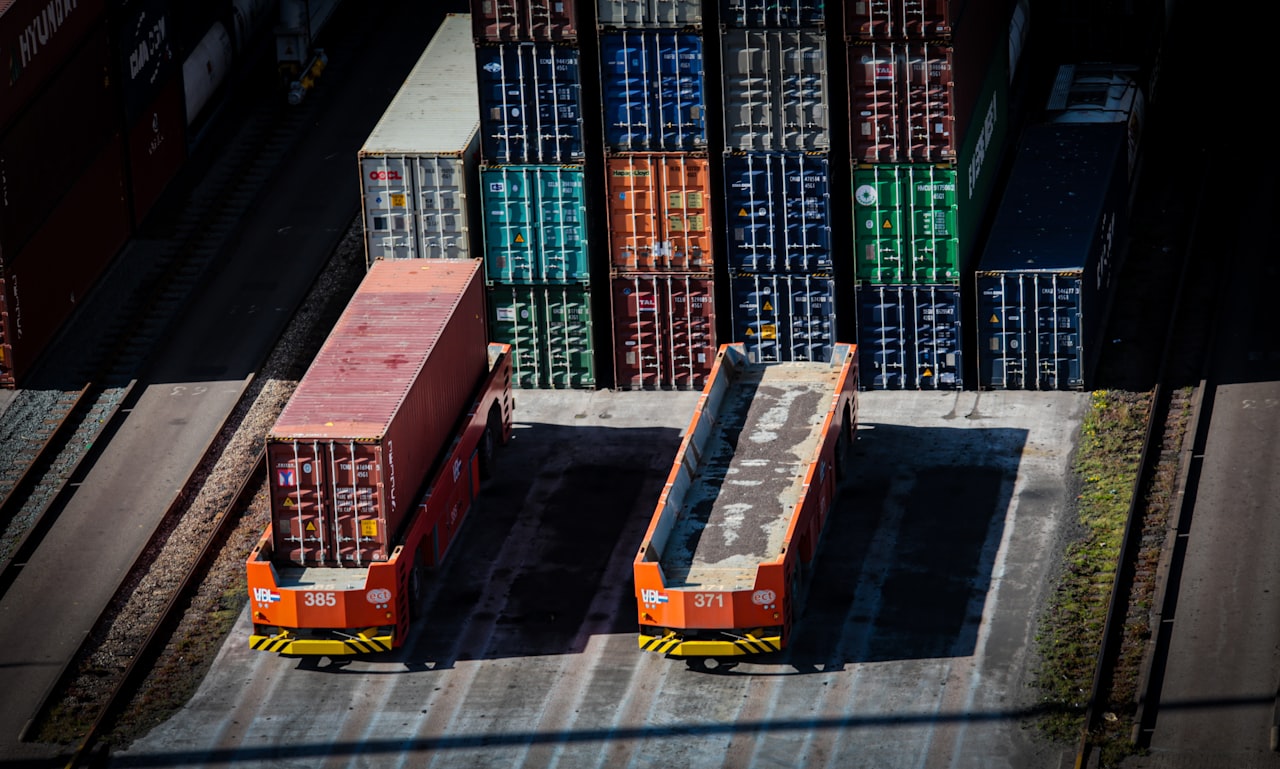 Stacked shipping containers and container chassis at an intermodal freight terminal