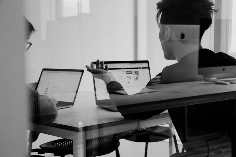 Professionals collaborating on technical debt solutions